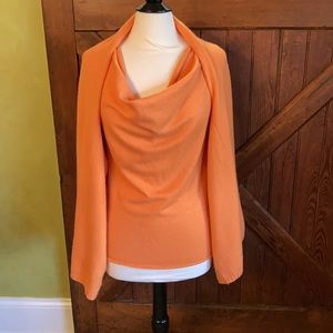 St John Cashmere shell and long shrug wrap . Super Chic ! Hermès Orange color!